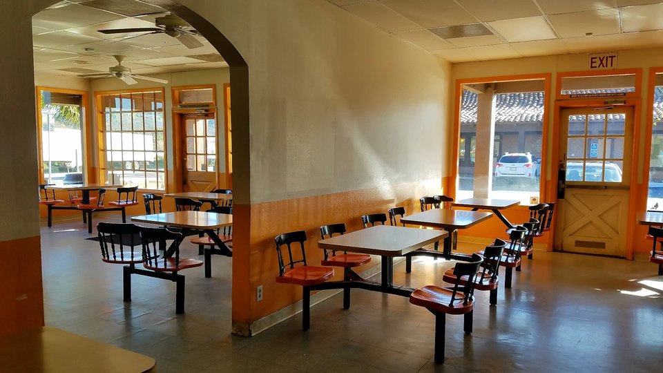 Fresh homemade dishes served with table settings.